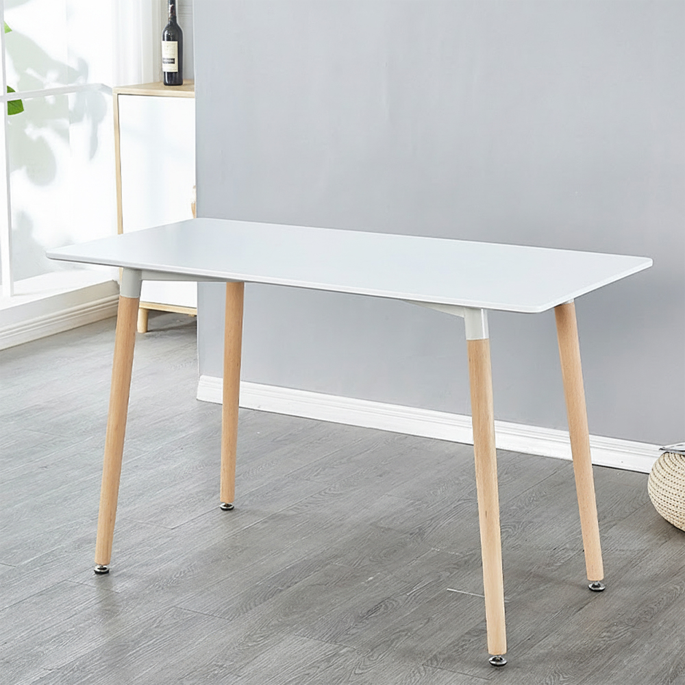 White dining table with wood legs